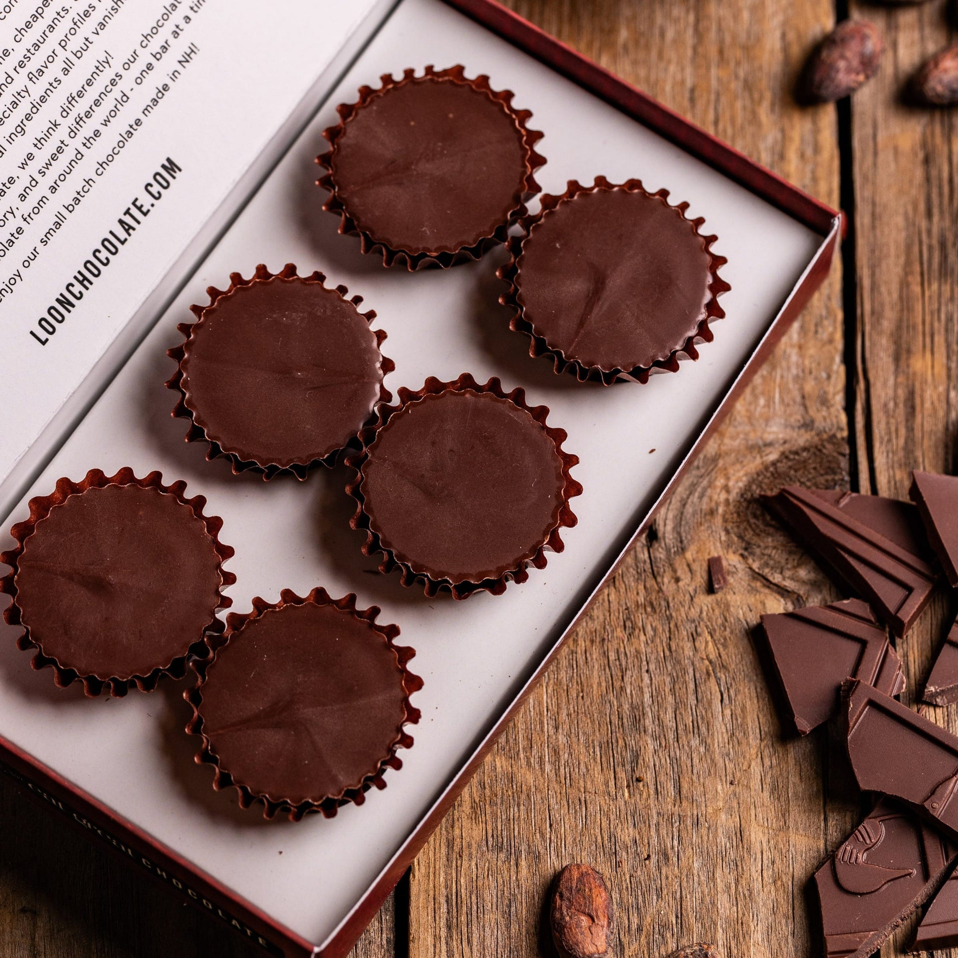 Loon Chocolate Milk Peanut Butter Cups in dark chocolate cups with red trim box