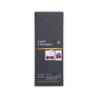 Lucid Chocolatier bar, dark grey box with gold band and award stickers, marked Sauternes 72% Dark, made in New Zealand.