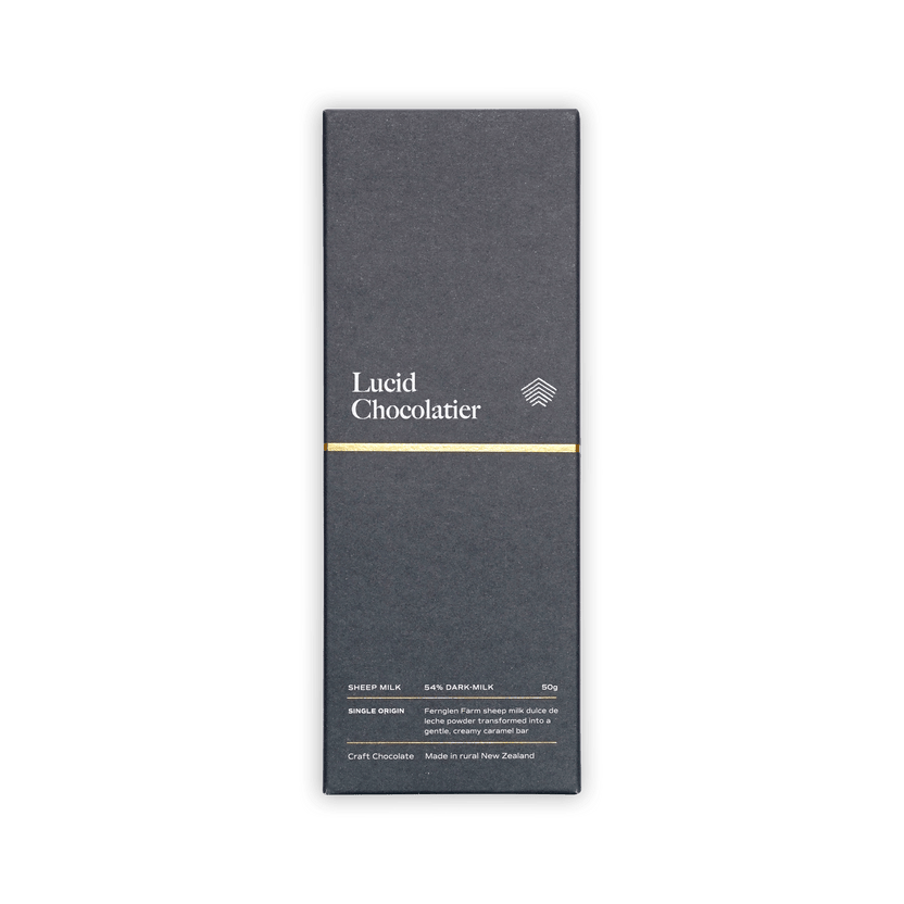 Lucid Chocolatier Sheep Milk 54% Dark-Milk bar in a charcoal box with gold stripe and white logo, single origin, 50g.