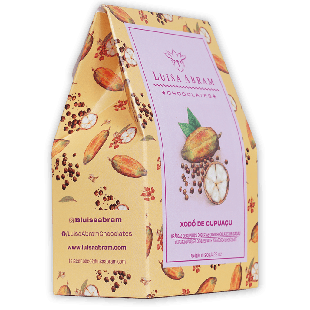 Yellow paper gift box with cocoa pod pattern, pink Luisa Abram label, cupuaçu fruit image