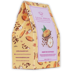 Yellow paper gift box with cocoa pod pattern, pink Luisa Abram label, cupuaçu fruit image