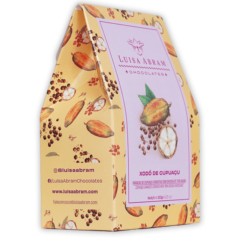 Yellow paper gift box with cocoa pod pattern, pink Luisa Abram label, cupuaçu fruit image