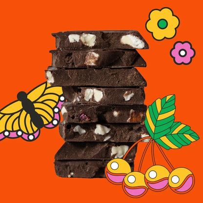 Maeve Rainier Cherry Truffle Bar: stack of dark chocolate with fruit pieces