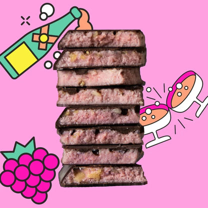 Maeve Sip Sip Hooray Truffle Bar: stack of pink chocolate-covered energy bars with nuts and seeds