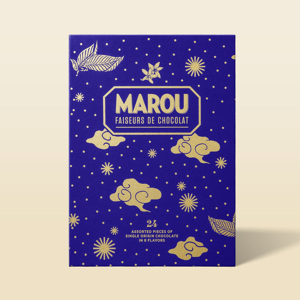 Deep blue Marou advent calendar with gold clouds, labeled 24 assorted pieces of single origin chocolate in 8 flavors