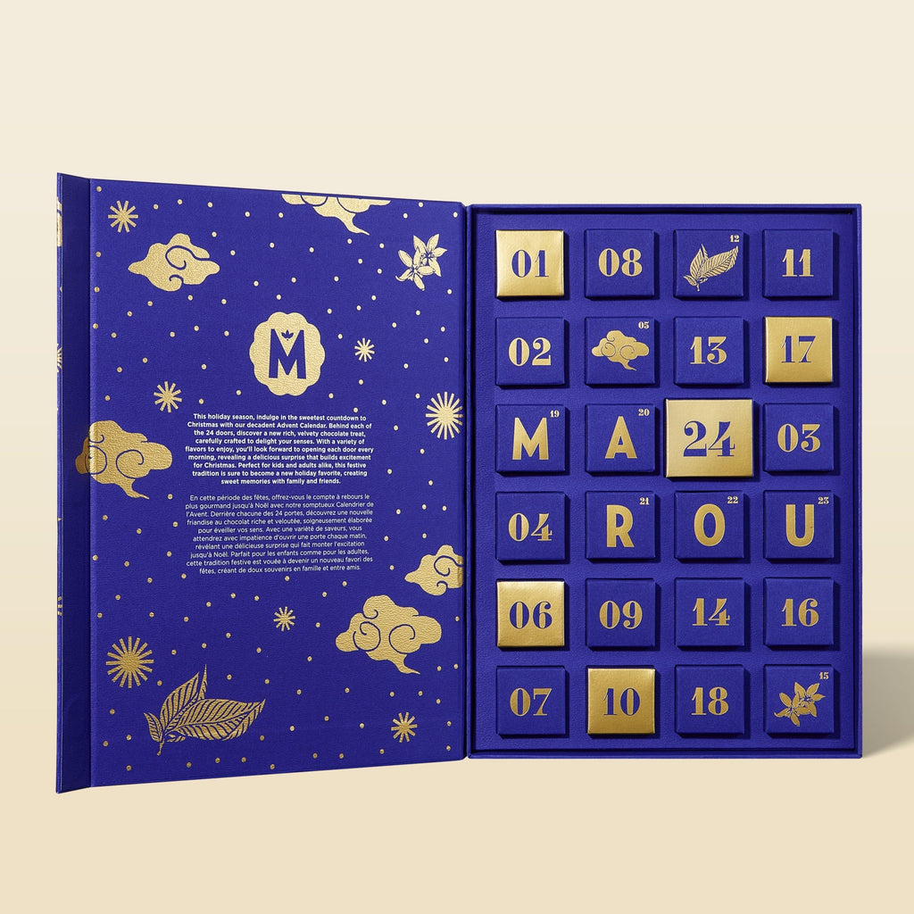 Marou advent calendar opened to 24 numbered blue and gold doors, five of them spelling MAROU
