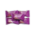 Purple and gold wrapped Mayana Chocolate Mini Pecan Paradise bars