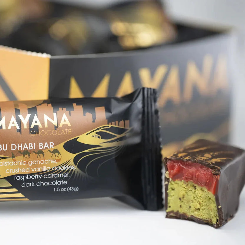 Mayana Mini Abu Dhabi Bar with dark chocolate, pistachio ganache, raspberry caramel