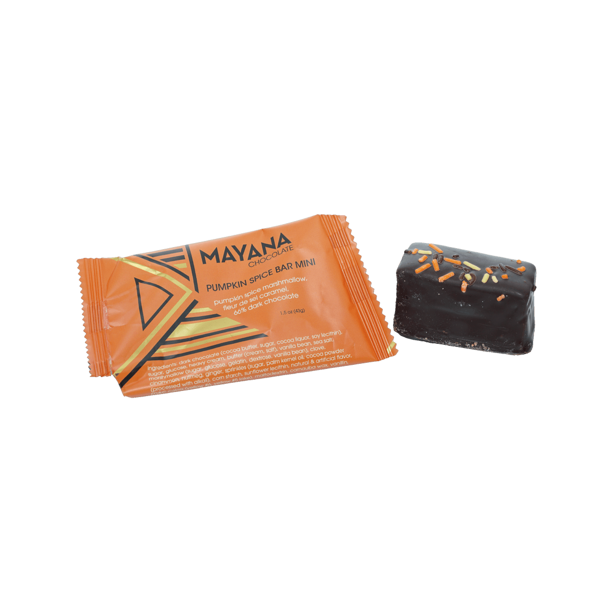 An unwrapped Mayana Pumpkin Spice Bar Mini with orange sprinkles beside its open orange wrapper.