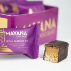 Mayana Chocolate Mini Pecan Paradise bar: purple wrap, gold geometric design