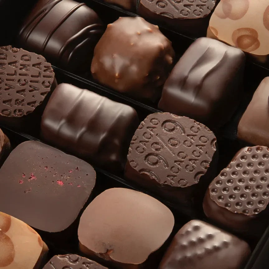 Michel Cluizel 28-piece mixed chocolate bon bons in black tray