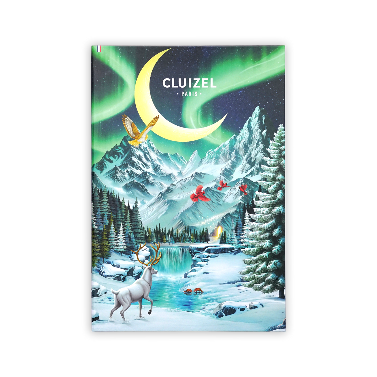 A Cluizel Paris advent calendar box featuring a snowy mountain scene with a white stag, moon, and aurora borealis.