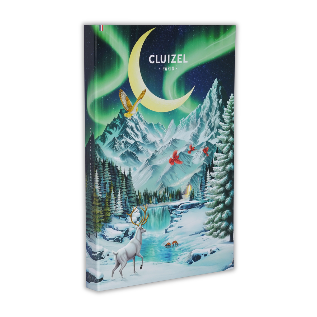 Cluizel Paris chocolate advent calendar box illustrated with a snowy mountain landscape, aurora, and a white stag.