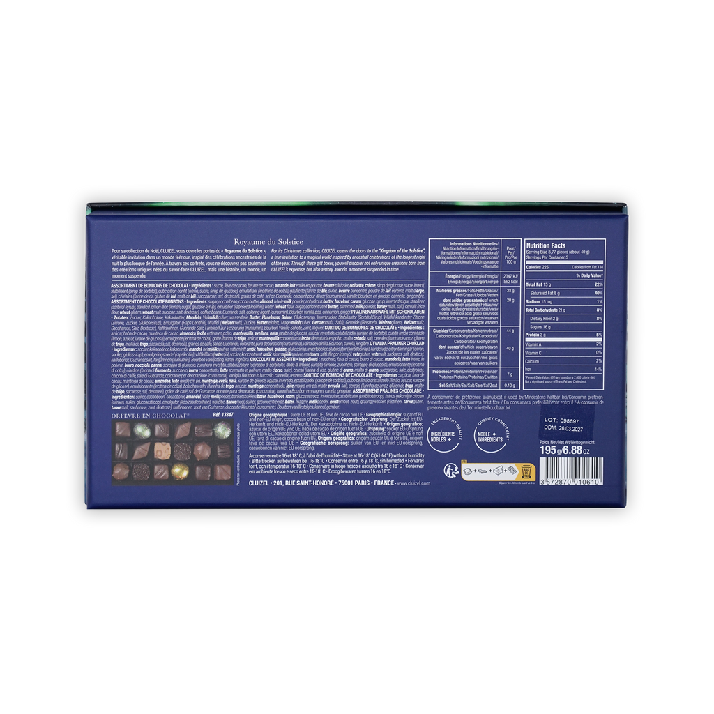 Back of a dark blue Michel Cluizel box on a white background, showing printed ingredients, nutrition facts, and a barcode.