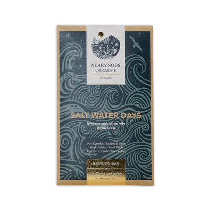 A rectangular dark blue wrapper with wave patterns for nearynogs chocolate dark salt water days 65% bar with gold seal