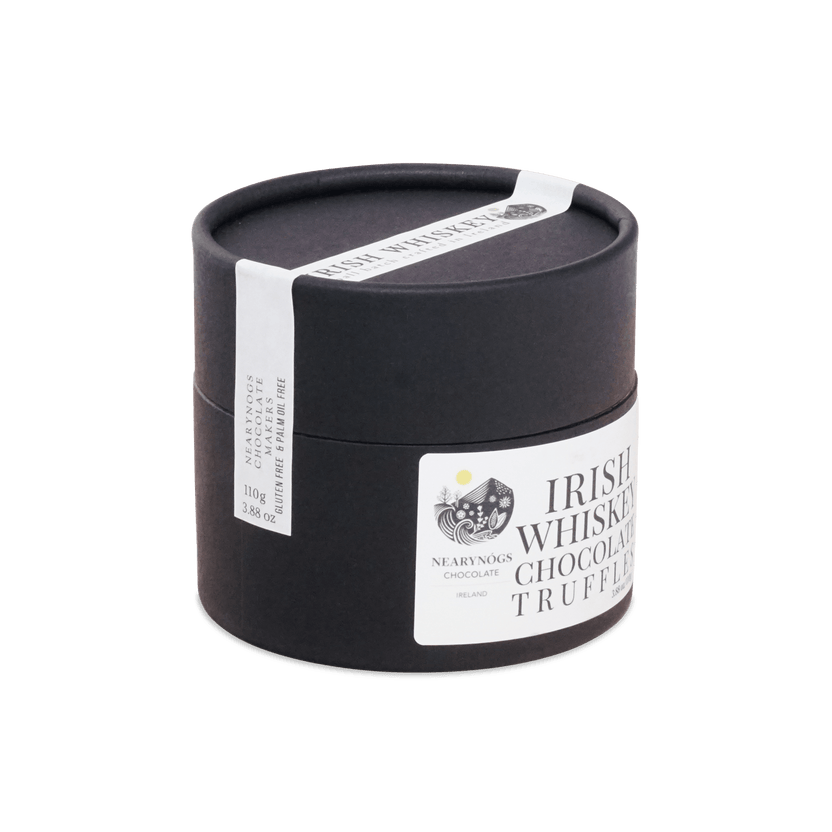 Black cylindrical container with white label and ribbon featuring nearynogs irish whiskey chocolate truffle dark truffles