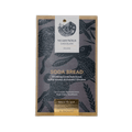 A rectangular package of nearynogs irish soda bread 60% chocolate with a dark gray wrapper featuring black birds and gold foil text