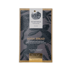 A rectangular package of nearynogs irish soda bread 60% chocolate with a dark gray wrapper featuring black birds and gold foil text