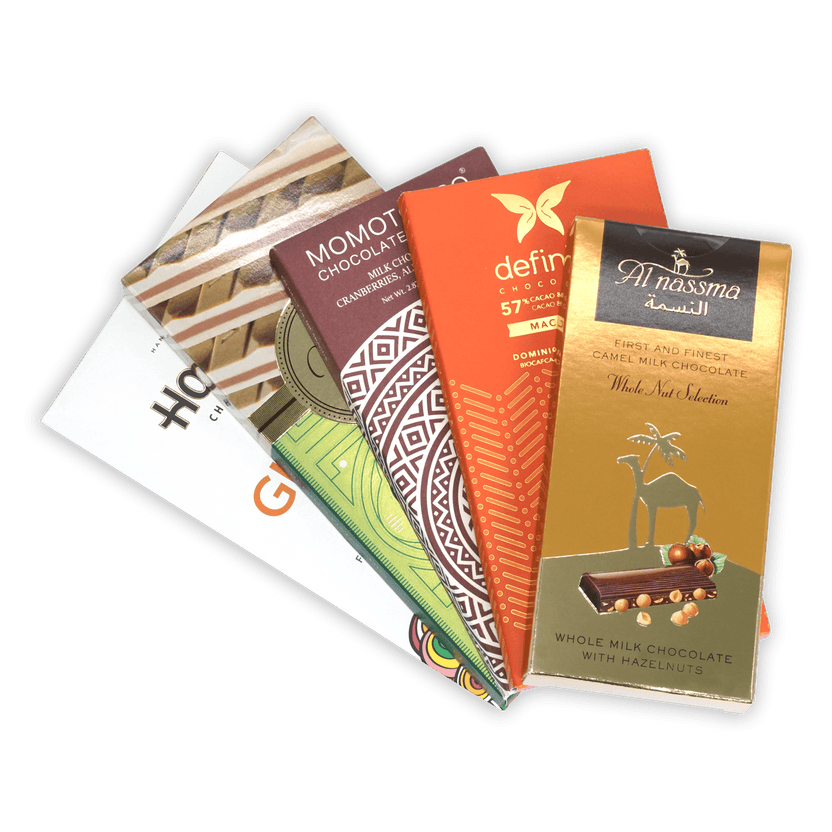 Golden Al Nassma camel milk chocolate bar wrapper with camel silhouette and hazelnuts in Nutty Chocolate Bar Bundle