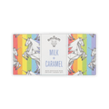 Omnom bar in rainbow-stripe wrapper with origami unicorns, white center panel reading Milk + Caramel.