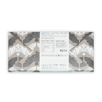 Omnom Coffee + Cream White Chocolate bar wrapper with gray bat and leaf pattern