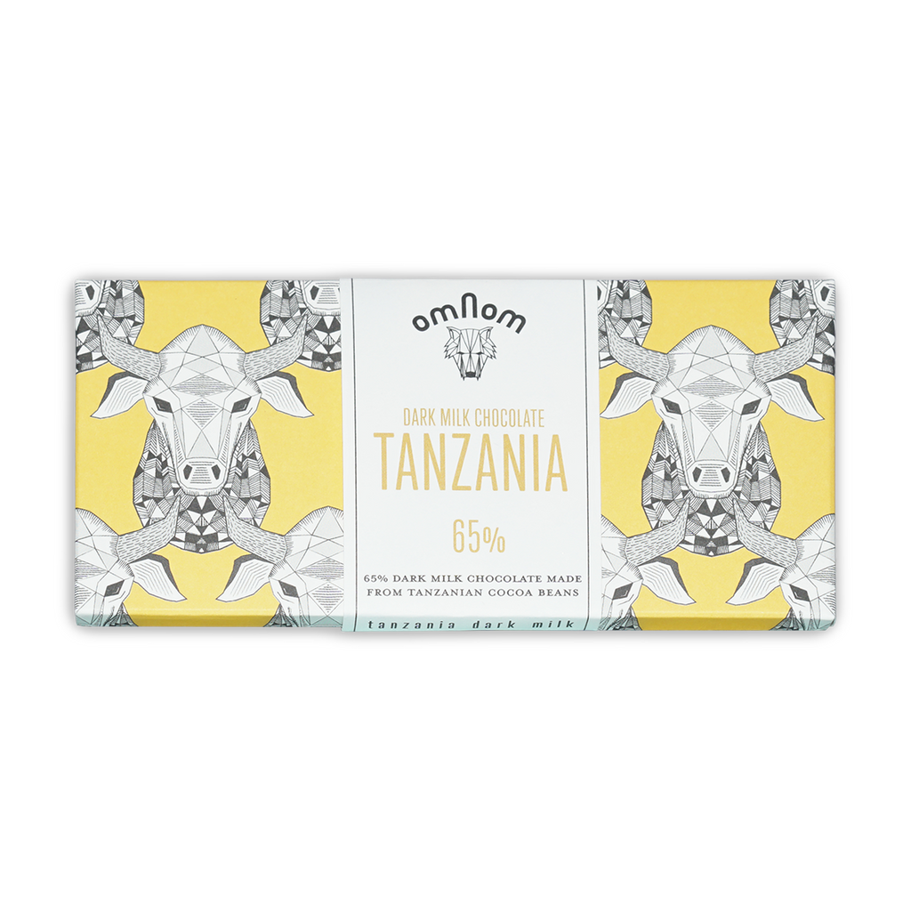 Omnom Dark Milk of Tanzania 65% yellow white bar with cow design