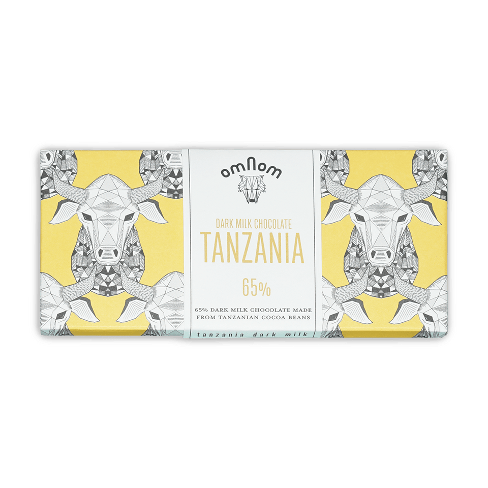 Omnom Dark Milk of Tanzania 65% yellow white bar with cow design