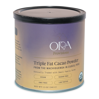 Ora triple fat cacao powder in cylindrical container with purple beige label