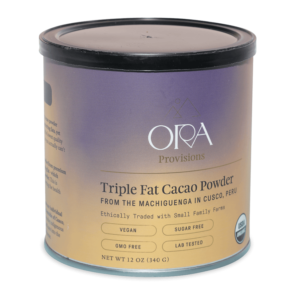 Ora triple fat cacao powder in cylindrical container with purple beige label