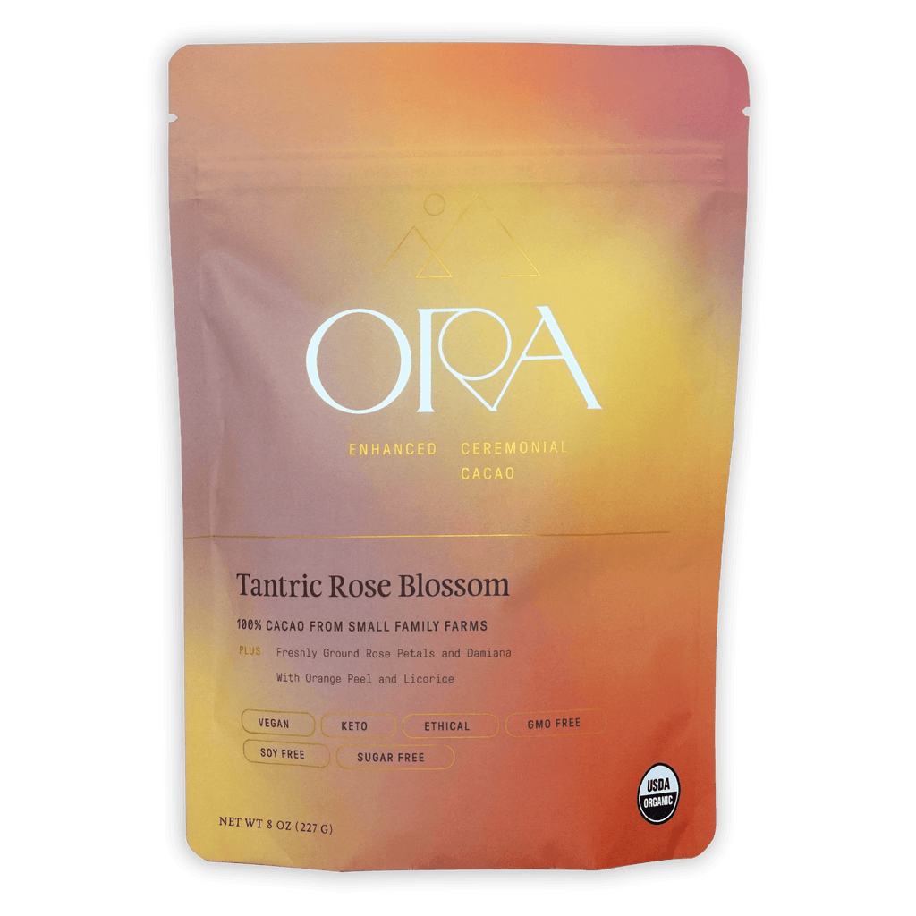 Ora Tantric Rose Blossom Cacao pouch in vibrant peach-to-orange gradient