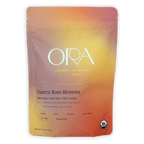 Ora Tantric Rose Blossom Cacao pouch in vibrant peach-to-orange gradient