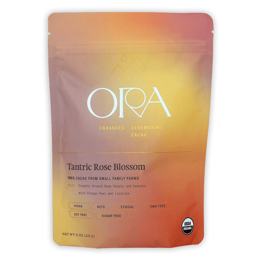 Ora Tantric Rose Blossom Cacao pouch in vibrant peach-to-orange gradient