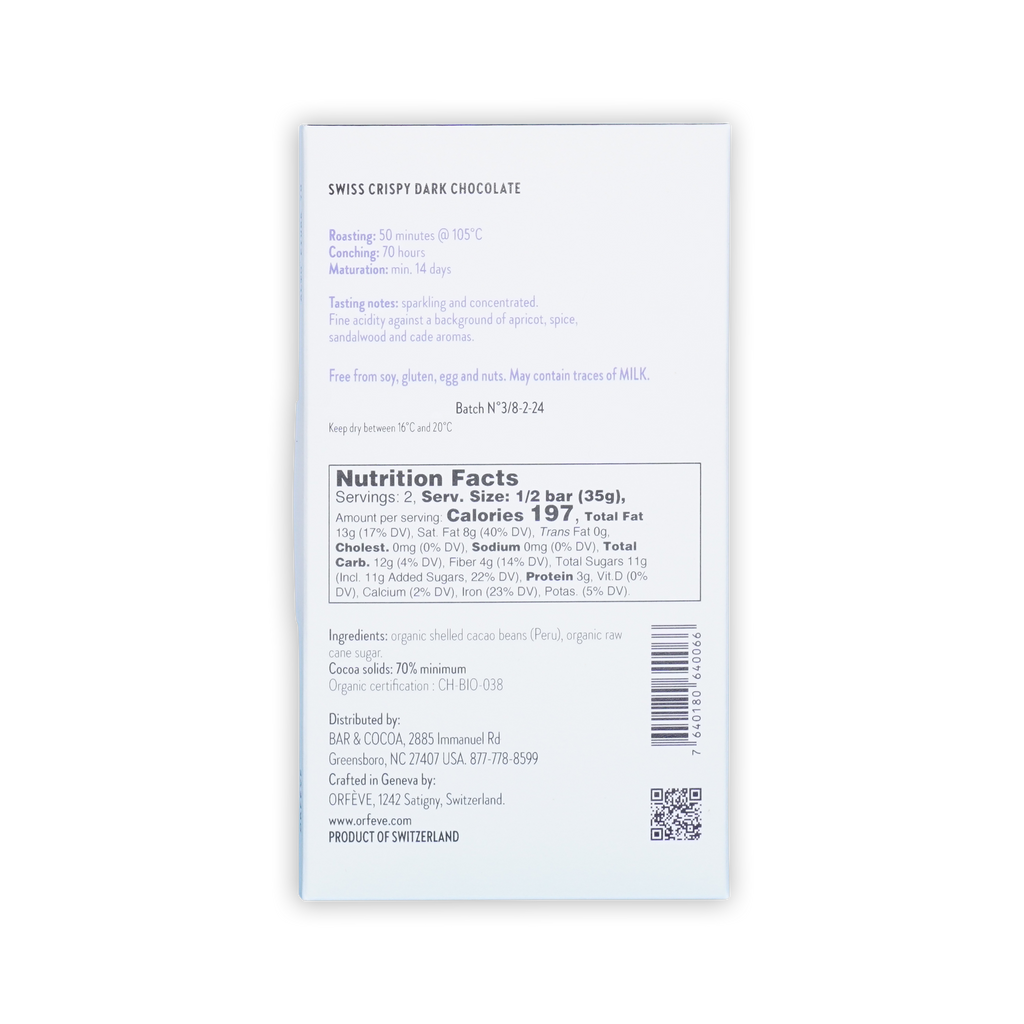 Back of a white Orfeve Swiss Crispy Dark Chocolate box on a black background, showing nutrition facts and ingredients.
