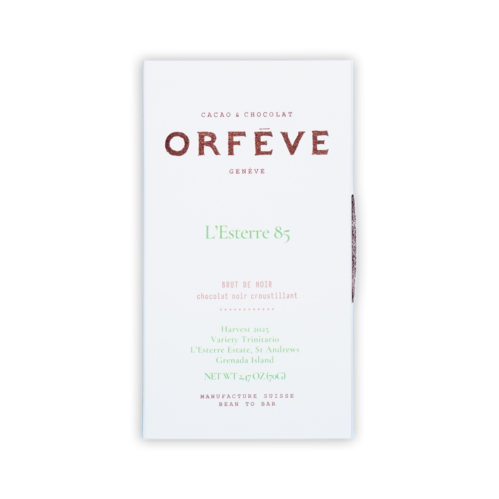A white box of Orfeve L'Esterre 85 chocolate on a black background with copper and green printed text.