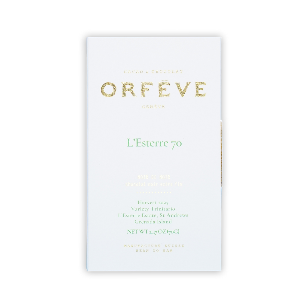 A white Orfeve L'Esterre 70 chocolate bar box with gold and green text on a black background.