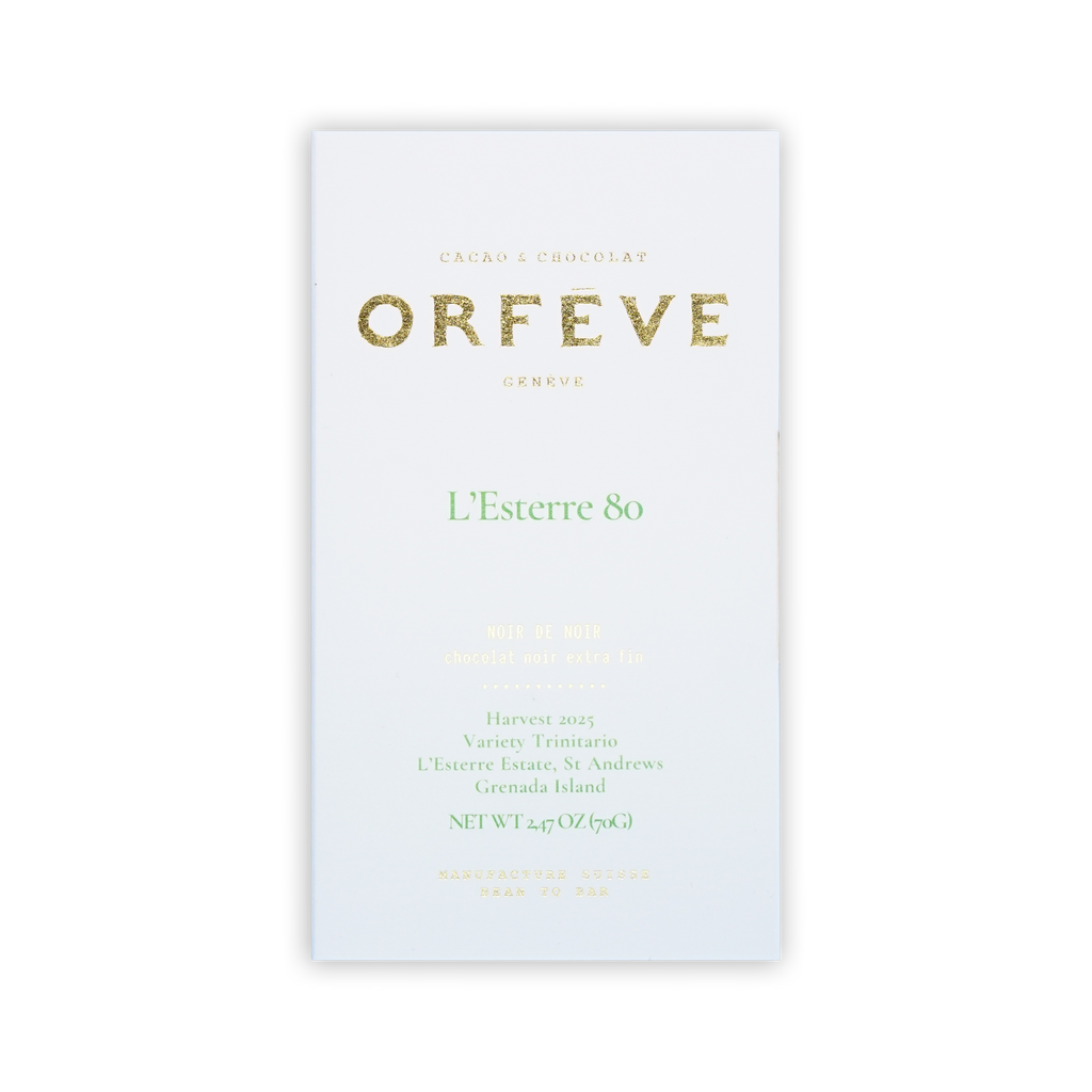 A white Orfeve L'Esterre 80 chocolate bar box with gold and green text on a black background.