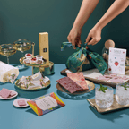Pop, Clink, Cocoa celebration chocolates with sparkling wine and a furoshiki being tied