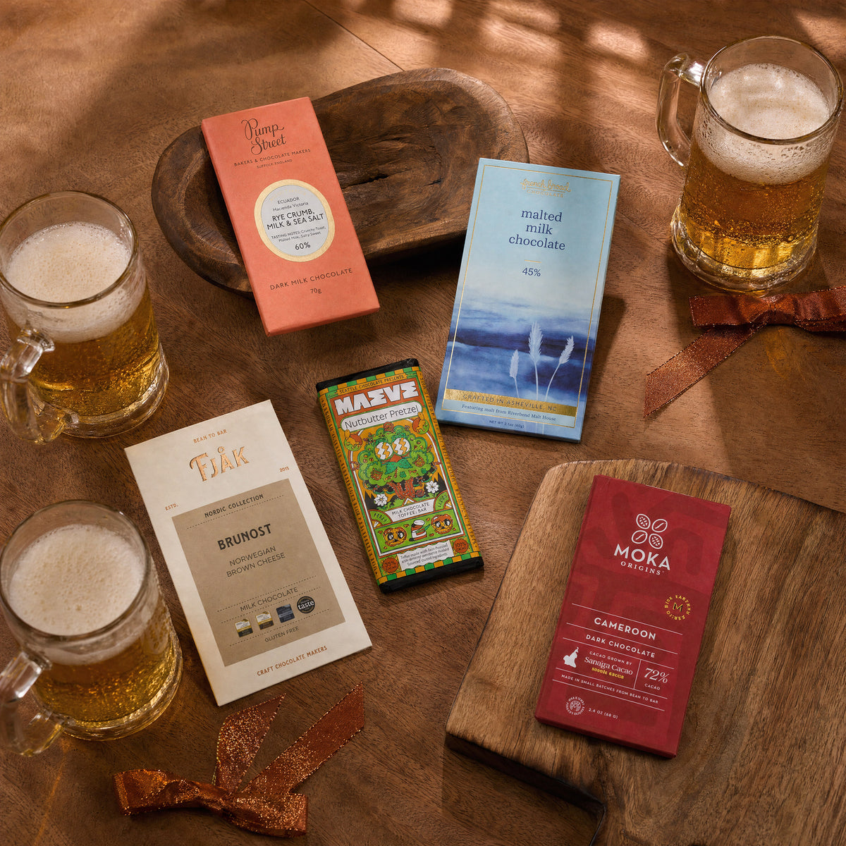 Pour and Pair beer chocolate gift bundle, five craft bars with mugs of beer.
