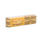 Pralus Infernale Milk Praline Bar in beige wrapper with yellow label and ribbon