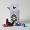 Pump Street Chicken and Egg Box Hot Cross Bun 60% dark chocolate chicken with egg candies