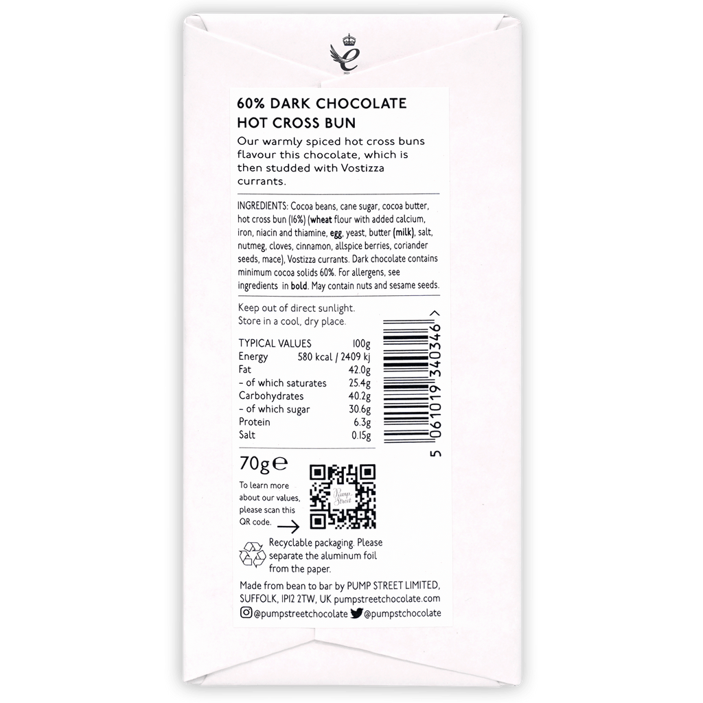 White rectangular chocolate bar wrapper with black text and crown logo featuring 60% dark chocolate hot cross bun flavor by pump street