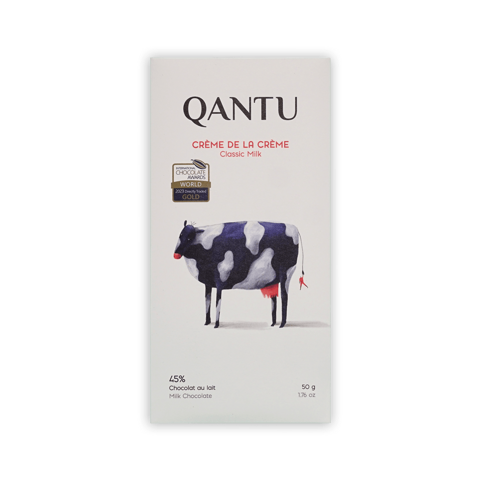 Qantu Creme de la Creme bar, cream box with painted black and white cow, Classic Milk 45%, gold award seal, 50g