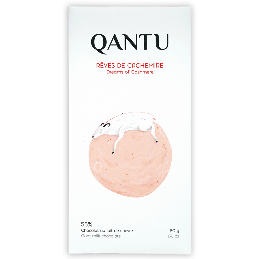 Qantu Dreams of Cashmere 55% goat milk chocolate bar in minimalist white wrapper with illustrated sheep on pink circle