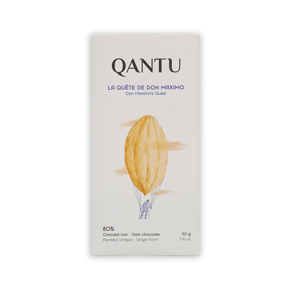 Qantu La Quete de Don Maximo 80% dark chocolate bar, cream box with a cacao-pod hot air balloon illustration, 50g.