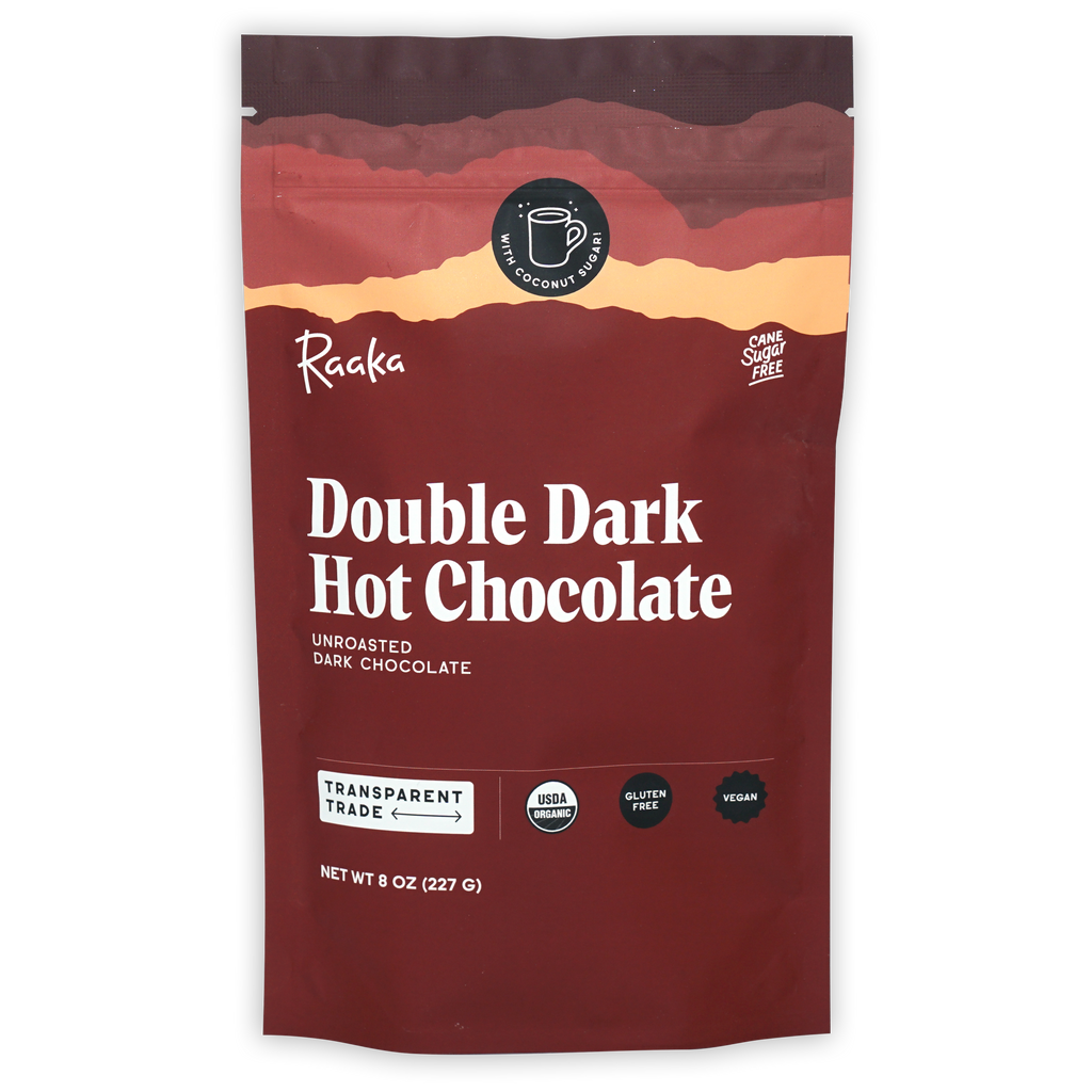 Raaka Double Dark Hot Chocolate maroon pouch with sunset design, organic cane sugar-free certifications