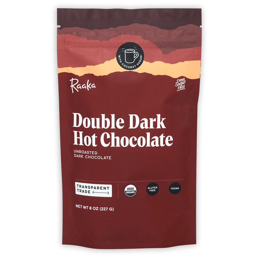 Raaka Double Dark Hot Chocolate maroon pouch with sunset design, organic cane sugar-free certifications