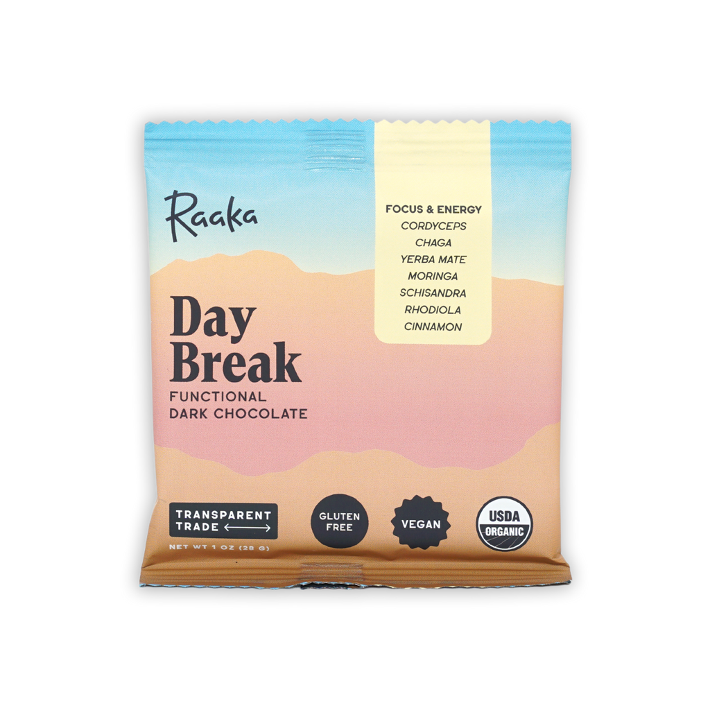 Raaka Day Break functional dark chocolate bar in pastel desert package