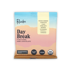 Raaka Day Break functional dark chocolate bar in pastel desert package