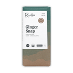Raaka Ginger Snap 70% unroasted dark chocolate bar in a green and tan patterned wrapper on a black background.