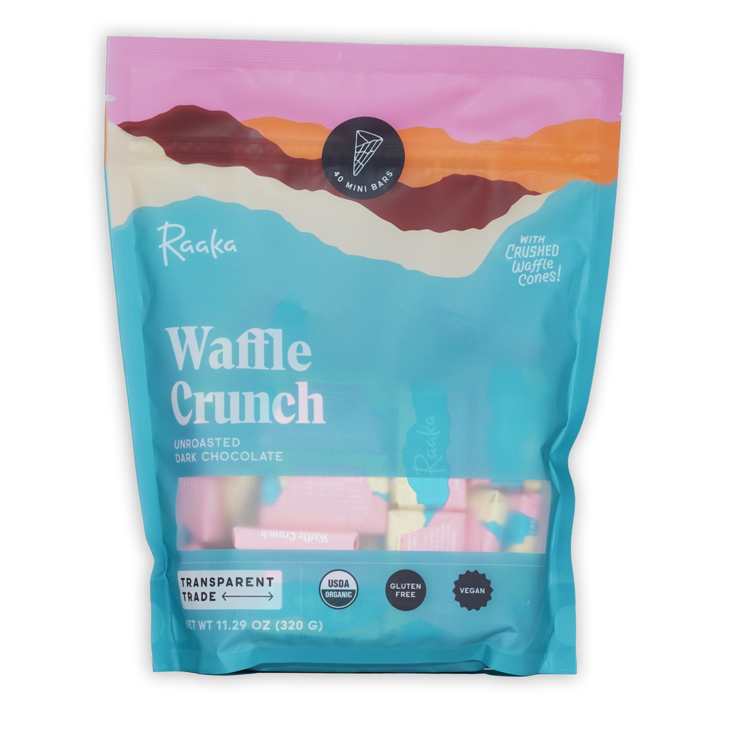 Raaka Waffle Crunch 61% unroasted dark mini bars in pink teal pouch